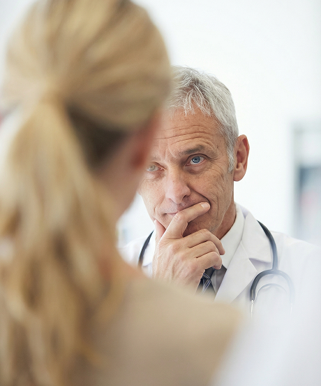 Clinician listening to a patient